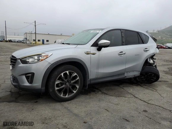 2016 Mazda CX-5 Grand Touring with VIN JM3KE2DY0G0852291, listed as a Copart auction lot 50665275 with 103,162 mi miles and Salvage Title. Bid and sale history available at carsss.com. Image 1.