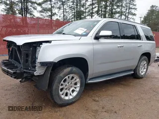 2015 GMC Yukon SLT with VIN 1GKS1BKC7FR628736, listed as a IAAI auction lot 41709926 with 130,254 mi miles. Bid and sale history available at carsss.com. Image 2.