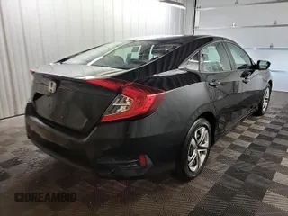 2017 Honda Civic LX with VIN 2HGFC2F58HH575889, listed as a IAAI auction lot 42285632 with 63,687 mi miles and . Bid and sale history available at DreamBid. Image 44.