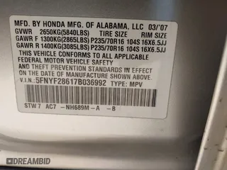 2007 Honda Pilot EX-L with VIN 5FNYF28617B036992, listed as a IAAI auction lot 41861449 with 159,439 mi miles. Bid and sale history available at carsss.com. Image 9.