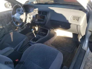 1999 Honda Civic DX with VIN 1HGEJ612XXL034351, listed as a Copart auction lot 76589714 with 192,975 mi miles and Salvage Title. Bid and sale history available at carsss.com. Image 8.