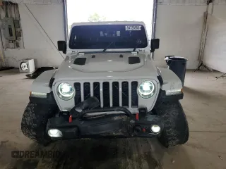 2020 Jeep Gladiator Rubicon z VIN 1C6JJTBG4LL102523, wystawiony jako Copart lot #54735955 z przebiegiem 104 579 mil mil oraz Szkoda całkowita • Salvage title. Historia ofert i sprzedaży dostępna na DreamBid. Obrazek 5.