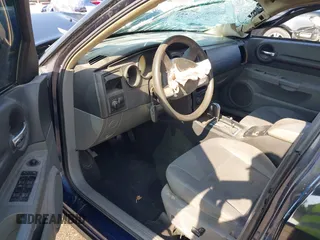 2005 Dodge Magnum SE z VIN 2D8FV48T05H516283, wystawiony jako IAAI lot #40663902 z przebiegiem 177 973 mil mil oraz . Historia ofert i sprzedaży dostępna na DreamBid. Obrazek 5.