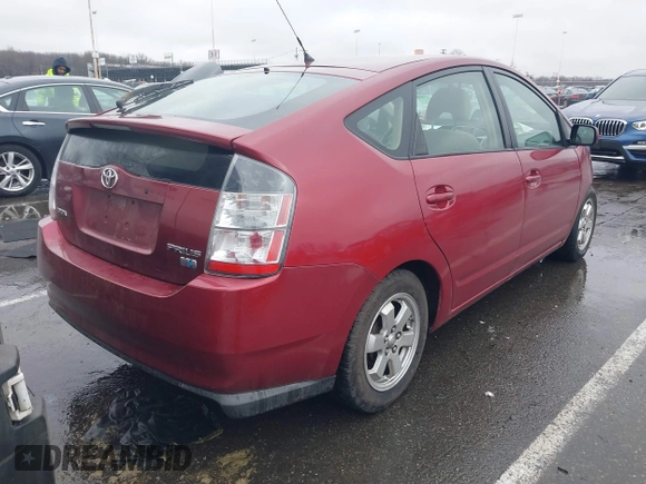 2005 Toyota Prius z VIN JTDKB20U257055663, wystawiony jako IAAI lot #41580381 z przebiegiem 123 032 mil mil oraz . Historia ofert i sprzedaży dostępna na DreamBid. Obrazek 4.
