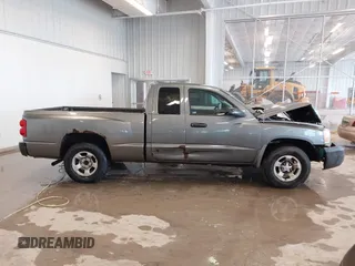 2005 Dodge Dakota ST with VIN 1D7HE22KX5S108948, listed as a IAAI auction lot 41588626 with 149,594 mi miles and . Bid and sale history available at DreamBid. Image 12.
