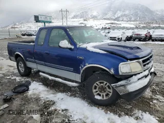 1997 Ford F-150 XL with VIN 1FTEX17LXVKB44786, listed as a Copart auction lot 49630955 with 301,736 mi miles and Salvage title. Bid and sale history available at DreamBid. Image 4.