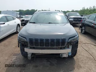 2021 Jeep Cherokee Latitude Lux with VIN 1C4PJMMX8MD147868, listed as a IAAI auction lot 42469226 with 115,829 mi miles and . Bid and sale history available at DreamBid. Image 13.