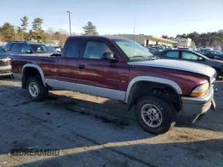 2000 Dodge Dakota SLT with VIN 1B7GG22X7YS639007, listed as a Copart auction lot 84829204 with 148,408 mi miles and Salvage Title. Bid and sale history available at DreamBid. Image 4.