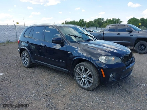 2011 BMW X5 35i with VIN 5UXZV4C53BL743050, listed as a IAAI auction lot 40074369 with 118,970 mi miles. Bid and sale history available at carsss.com. Image 1.