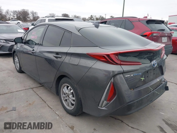 2018 Toyota Prius Plus with VIN JTDKARFPXJ3087064, listed as a IAAI auction lot 41433495 with 118,298 mi miles and . Bid and sale history available at DreamBid. Image 3.
