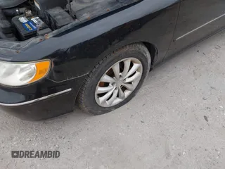 2007 Hyundai Azera SE z VIN KMHFC46F67A244191, wystawiony jako IAAI lot #42273775 z przebiegiem 178 713 mil mil oraz . Historia ofert i sprzedaży dostępna na DreamBid. Obrazek 13.