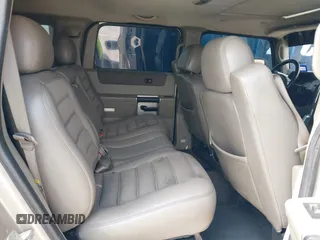2003 Hummer H2 with VIN 5GRGN23U43H125114, listed as a IAAI auction lot 42160986 with 157,776 mi miles. Bid and sale history available at carsss.com. Image 8.
