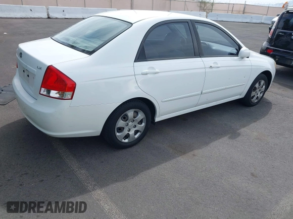 2009 Kia Spectra EX with VIN KNAFE221795630995, listed as a IAAI auction lot 41928252 with 126,694 mi miles. Bid and sale history available at carsss.com. Image 4.