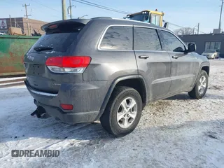 2017 Jeep Grand Cherokee Laredo with VIN 1C4RJFAG7HC876531, listed as a IAAI auction lot 41354471 with 129,056 mi miles. Bid and sale history available at carsss.com. Image 4.