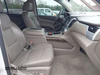 2016 GMC Yukon SLT with VIN 1GKS2BKC5GR374815, listed as a IAAI auction lot 41889495 with 163,464 mi miles. Bid and sale history available at carsss.com. Image 5.