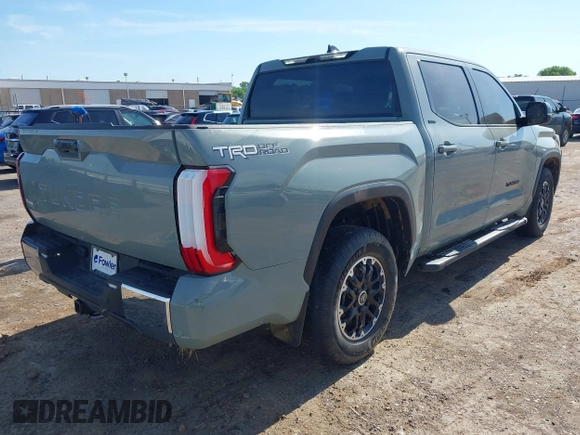 2022 Toyota Tundra SR5 with VIN 5TFLA5AB7NX013477, listed as a IAAI auction lot 42172272 with 30,460 mi miles and . Bid and sale history available at DreamBid. Image 4.