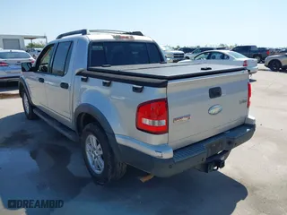 2010 Ford Explorer Sport Trac XLT with VIN 1FMEU3BE2AUA00236, listed as a IAAI auction lot 41981531 with 101,993 mi miles. Bid and sale history available at carsss.com. Image 3.