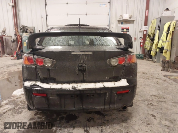 2015 Mitsubishi Lancer SE with VIN JA32V2FW6FU019508, listed as a IAAI auction lot 41633196 with 91,758 mi miles. Bid and sale history available at carsss.com. Image 16.