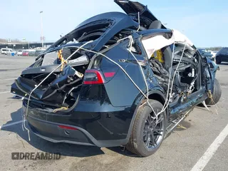 2024 Tesla Model Y Long Range with VIN 7SAYGDEE4RF149894, listed as a IAAI auction lot 41771185 with Not Provided miles and . Bid and sale history available at DreamBid. Image 4.