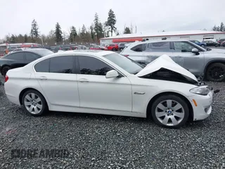 2013 BMW 5 Series 528i xDrive with VIN WBAXH5C54DDW13438, listed as a IAAI auction lot 41851954 with 122,653 mi miles. Bid and sale history available at carsss.com. Image 13.