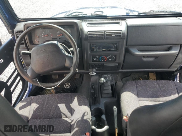 2001 Jeep Wrangler SE with VIN 1J4FA29P51P354795, listed as a Copart auction lot 73874834 with 0 mi miles and Salvage Title. Bid and sale history available at carsss.com. Image 8.