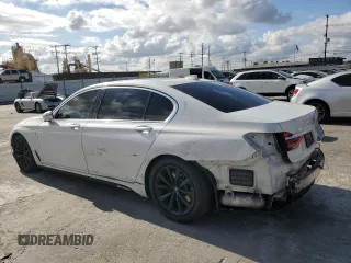 2018 BMW 7 Series 740e xDrive iPerformance with VIN WBA7J2C51JG938111, listed as a Copart auction lot 73361933 with 104,641 mi miles. Bid and sale history available at carsss.com. Image 2.