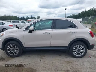 2016 FIAT 500X Lounge with VIN ZFBCFYDT0GP345757, listed as a IAAI auction lot 42539167 with 59,582 mi miles and . Bid and sale history available at DreamBid. Image 14.