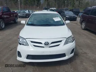 2012 Toyota Corolla L with VIN 2T1BU4EE4CC884754, listed as a IAAI auction lot 42041998 with 113,615 mi miles. Bid and sale history available at carsss.com. Image 12.
