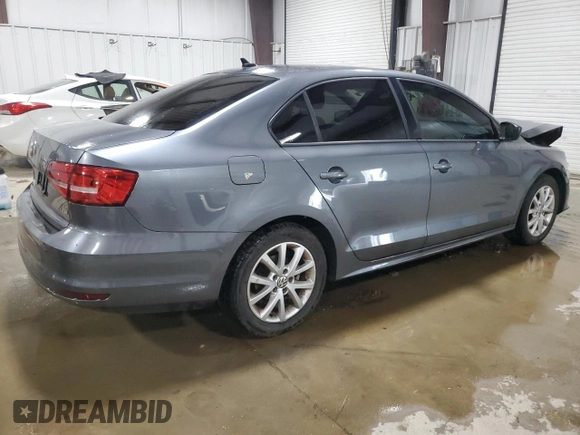2015 Volkswagen Jetta SE with VIN 3VWD07AJ6FM343142, listed as a Copart auction lot 62472655 with 117,349 mi miles and Salvage title. Bid and sale history available at DreamBid. Image 3.