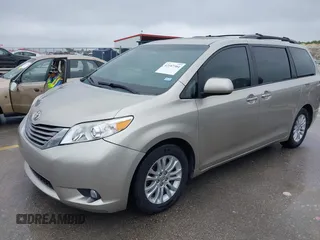 2015 Toyota Sienna XLE with VIN 5TDYK3DCXFS578888, listed as a IAAI auction lot 42187384 with 105,287 mi miles and . Bid and sale history available at DreamBid. Image 2.