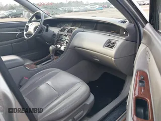 2002 Toyota Avalon XL with VIN 4T1BF28B82U205176, listed as a IAAI auction lot 41569373 with Not Provided miles and . Bid and sale history available at DreamBid. Image 5.