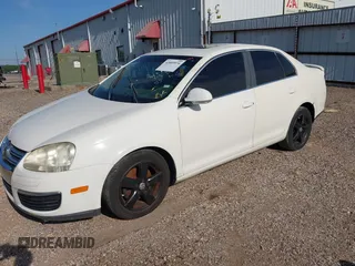 2008 Volkswagen Jetta Sedan SE with VIN 3VWRM71K18M042753, listed as a IAAI auction lot 42009974 with 208,244 mi miles. Bid and sale history available at carsss.com. Image 2.