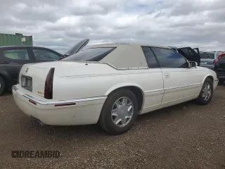 2002 Cadillac Eldorado ESC with VIN 1G6EL12Y52B103303, listed as a Copart auction lot 53337965 with 98,007 mi miles and Clean Title. Bid and sale history available at DreamBid. Image 3.