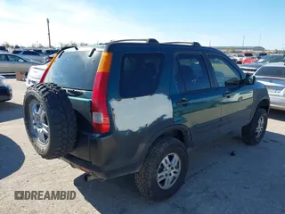 2002 Honda CR-V EX with VIN JHLRD78842C040973, listed as a IAAI auction lot 41214880 with 153,429 mi miles and . Bid and sale history available at DreamBid. Image 4.