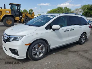 2020 Honda Odyssey EX-L z VIN 5FNRL6H79LB040523, wystawiony jako Copart lot #57383005 z przebiegiem 105 754 mil mil oraz Szkoda całkowita • Salvage title. Historia ofert i sprzedaży dostępna na DreamBid. Obrazek 1.