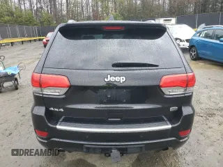 2014 Jeep Grand Cherokee Overland with VIN 1C4RJFCG1EC587458, listed as a Copart auction lot 50213015 with 124,266 mi miles and Salvage Title. Bid and sale history available at carsss.com. Image 6.
