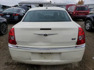 2009 Chrysler 300 Limited with VIN 2C3KA33V39H590917, listed as a Copart auction lot 77657054 with 180,613 mi miles and Clean Title. Bid and sale history available at carsss.com. Image 6.