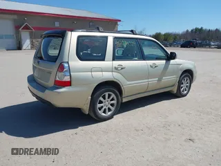 2007 Subaru Forester X w/Premium Pkg with VIN JF1SG65627H719188, listed as a IAAI auction lot 42074029 with 191,763 mi miles. Bid and sale history available at carsss.com. Image 4.