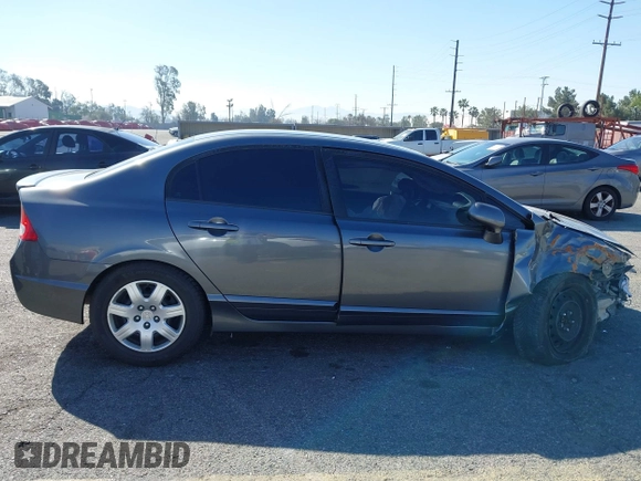 2009 Honda Civic LX z VIN 19XFA16539E021784, wystawiony jako IAAI lot #41674944 z przebiegiem 52 474 mil mil oraz . Historia ofert i sprzedaży dostępna na DreamBid. Obrazek 13.