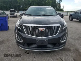 2023 Cadillac XT5 AWD Premium Luxury with VIN 1GYKNDRSXPZ145763, listed as a Copart auction lot 58387365 with 51,368 mi miles and Salvage title. Bid and sale history available at DreamBid. Image 5.