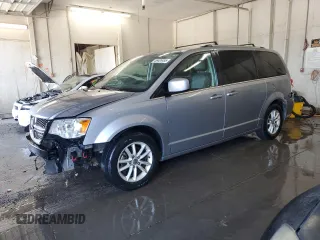 2018 Dodge Grand Caravan SXT z VIN 2C4RDGCGXJR297492, wystawiony jako Copart lot #56485455 z przebiegiem 158 656 mil mil oraz Szkoda całkowita • Salvage title. Historia ofert i sprzedaży dostępna na DreamBid. Obrazek 1.