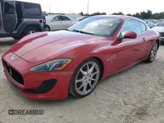 2014 Maserati GranTurismo Sport z VIN ZAM45VLA5E0083111, wystawiony jako Copart lot #74052684 z przebiegiem Nie podano mil oraz Szkoda całkowita • Salvage title. Historia ofert i sprzedaży dostępna na DreamBid. Obrazek 1.