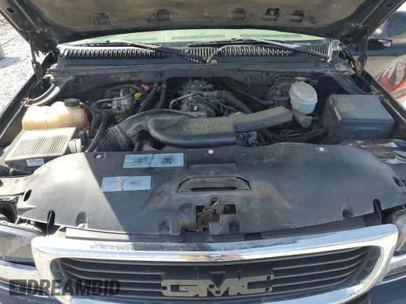 2003 GMC Yukon SLT z VIN 1GKEK13Z53J161625, wystawiony jako Copart lot #54055495 z przebiegiem 346 994 mil mil oraz Nie do naprawy • Non repairable. Historia ofert i sprzedaży dostępna na DreamBid. Obrazek 12.