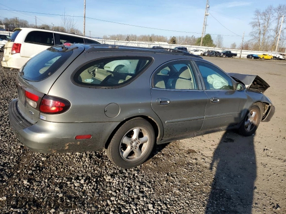 2002 Ford Taurus SE Standard with VIN 1FAHP58S22G280778, listed as a Copart auction lot 42013935 with 255,134 mi miles and Salvage title. Bid and sale history available at DreamBid. Image 3.