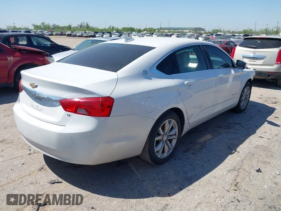 2018 Chevrolet Impala LT with VIN 1G1105S34JU106107, listed as a IAAI auction lot 41871693 with 111,412 mi miles and . Bid and sale history available at DreamBid. Image 4.