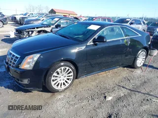 2013 Cadillac CTS Performance with VIN 1G6DC1E31D0131609, listed as a IAAI auction lot 41756903 with 93,296 mi miles and . Bid and sale history available at DreamBid. Image 2.