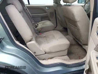 2005 Ford Freestyle SE z VIN 1FMZK01185GA41608, wystawiony jako IAAI lot #42088688 z przebiegiem 192 516 mil mil oraz . Historia ofert i sprzedaży dostępna na DreamBid. Obrazek 8.