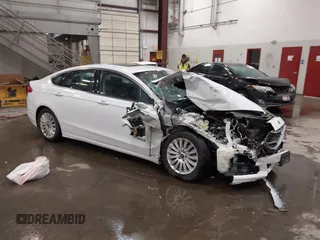 2015 Ford Fusion SE Hybrid with VIN 3FA6P0LU1FR225241, listed as a IAAI auction lot 42349797 with 85,725 mi miles and . Bid and sale history available at DreamBid. Image 1.
