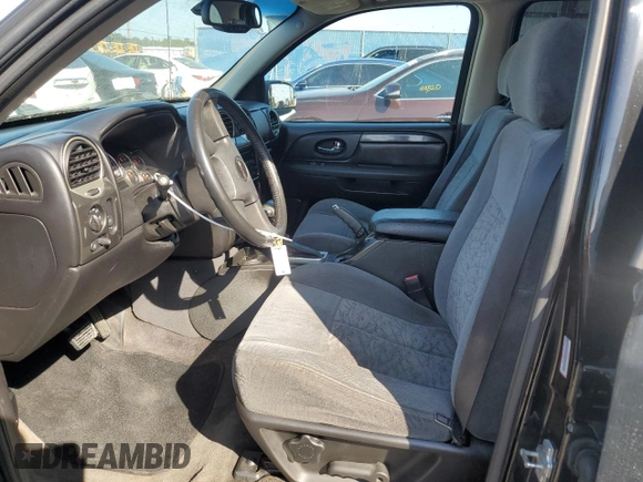 2006 GMC Envoy SLT with VIN 1GKDT13S062230103, listed as a Copart auction lot 44923425 with 158,020 mi miles and Salvage Title. Bid and sale history available at carsss.com. Image 7.