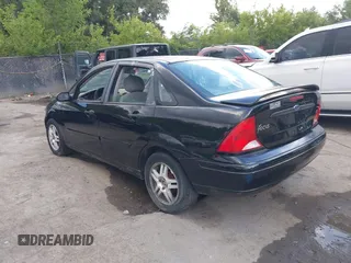 2000 Ford Focus SE with VIN 1FAFP3431YW182169, listed as a IAAI auction lot 42539335 with Not provided miles and . Bid and sale history available at DreamBid. Image 3.